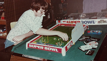 Retro photos of kids playing with Tudor Games Vintage Electric Football Games 